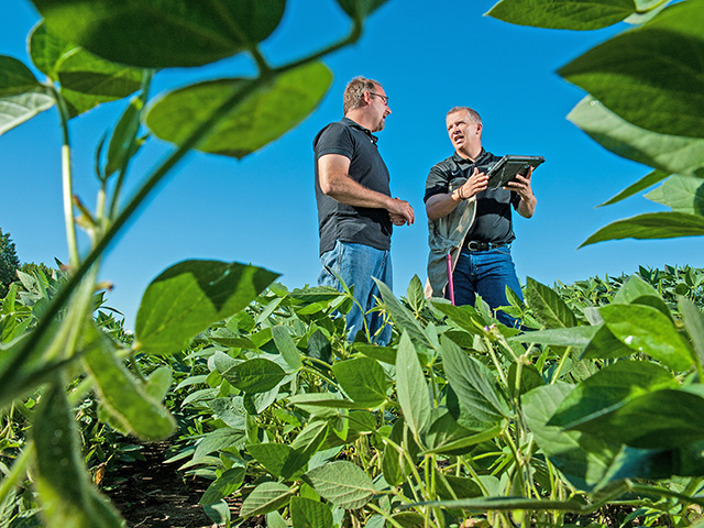 Farmer Kevin Malecek (left) relies on technology and crop consultant Jared Anez to make agronomic decisions. (Progressive Farmer photo by Steve Woit)